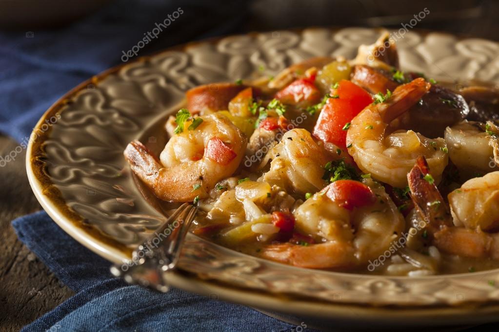 Table filled with Louisiana seafood and local dishes