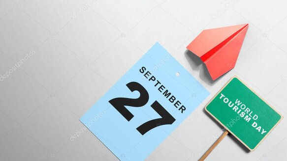 Busy outdoor event with visitors engaging with tourism information